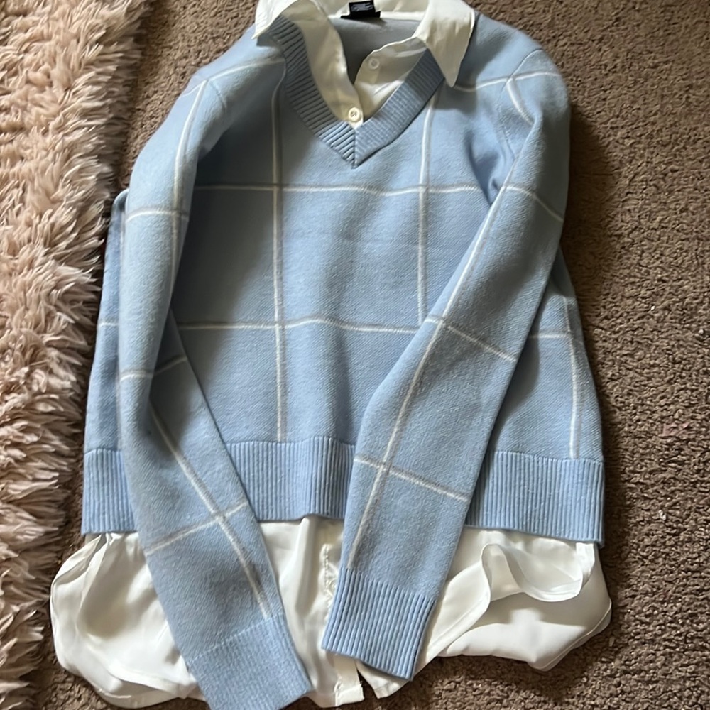 One gray and one blue sweaters